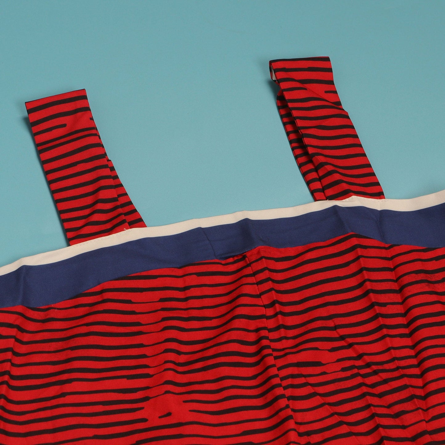 Rear view of the CM.YAYA Women's Striped Wide Leg Sleeveless Jumpsuit highlighting its fashionable design and comfortable fit, available from Hot Trends Area.