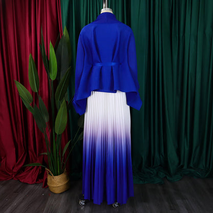 Stylish women's outfit set from CM.YAYA, featuring a v-neck blouse and an elastic waist pleated skirt, ideal for high street luxury.