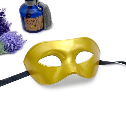 Elegant Half Face Halloween Masquerade Party Mask in stunning gold, perfect for a touch of sophistication and allure at costume events.