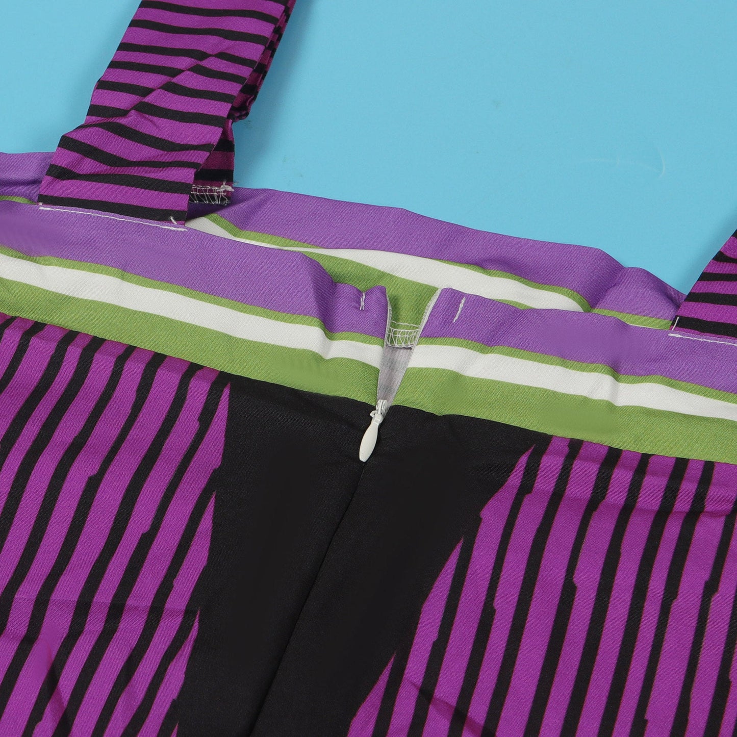 Luxurious CM.YAYA Women’s Striped Wide Leg Sleeveless Jumpsuit with Pockets, featuring a chic high waist design, perfect for elegant summer outings.