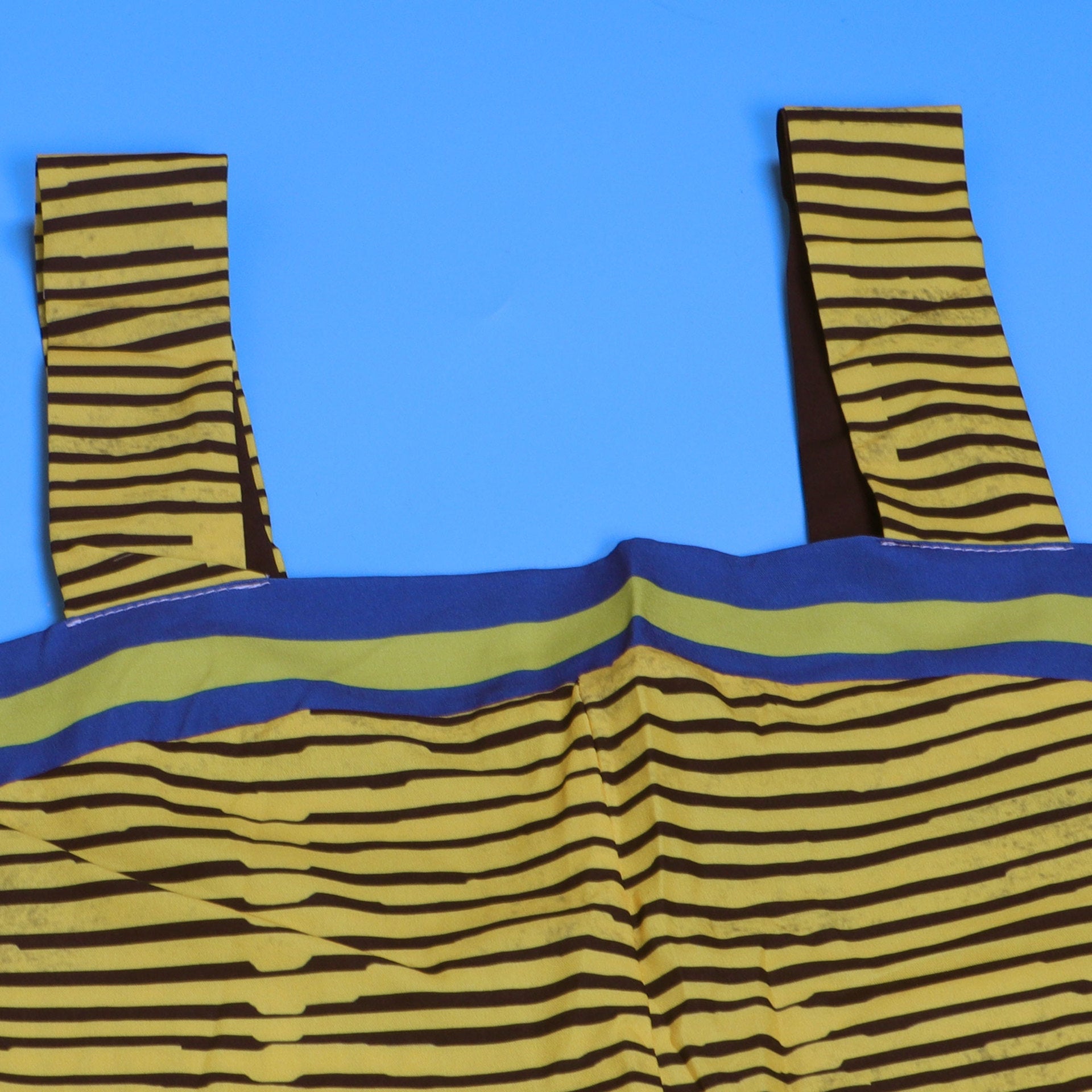 Full length CM.YAYA Women’s Jumpsuit featuring a modern sleeveless design and wide leg cut, embodying luxury and comfort for the fashion-forward woman.