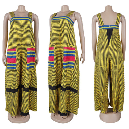 Fashionable CM.YAYA Women’s Striped Wide Leg Jumpsuit set against a stylish backdrop, embodying summer elegance and comfort for modern women.