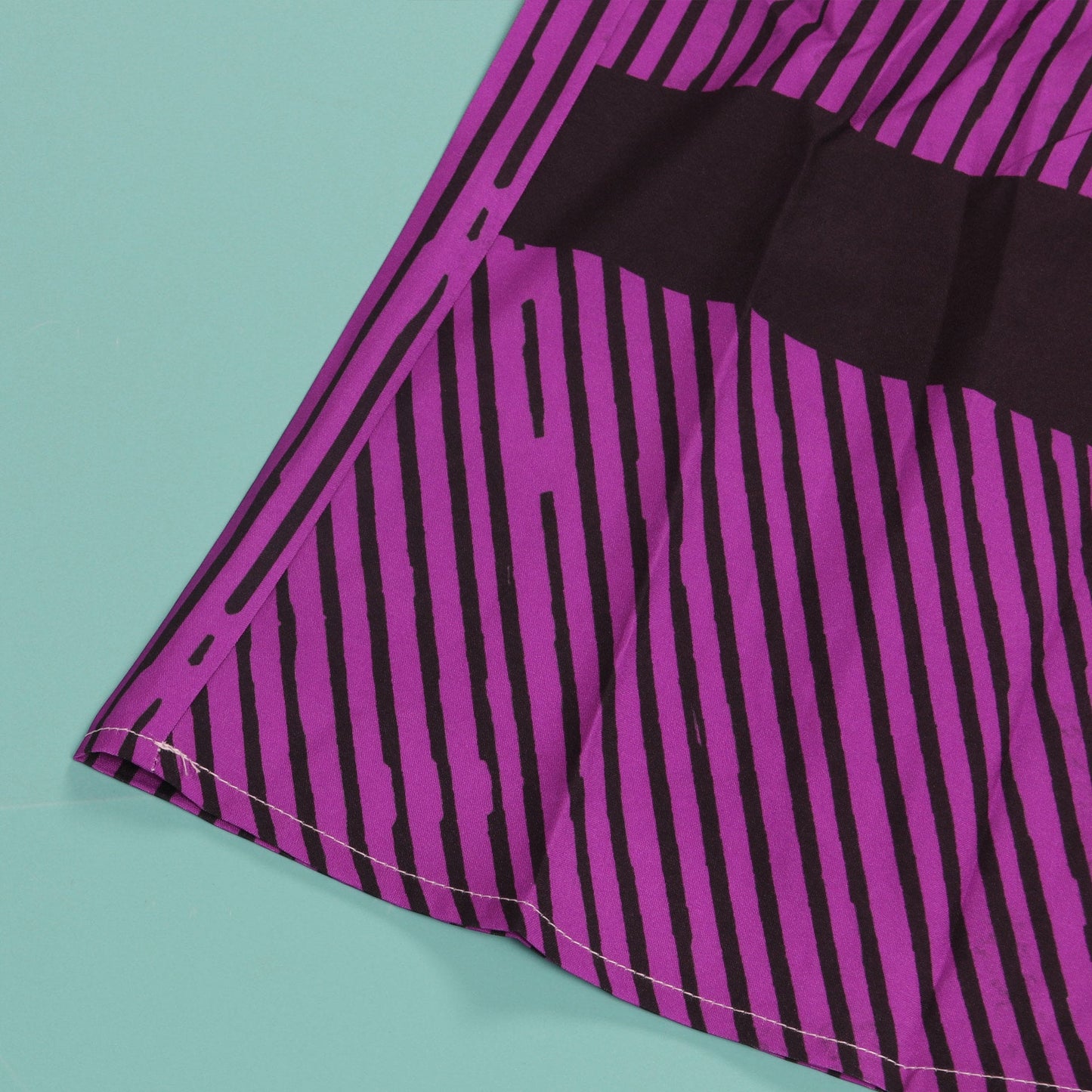 Lifestyle image of a model wearing the CM.YAYA Women’s Striped Wide Leg Jumpsuit, enhancing the relaxed elegance of summer fashion.