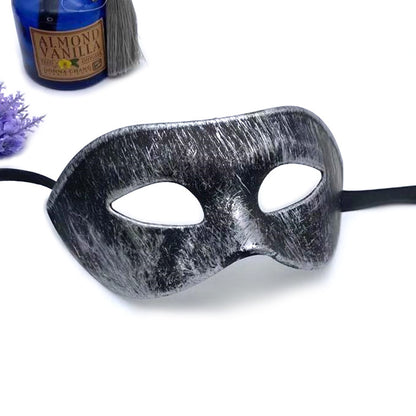 Elegant Half Face Halloween Masquerade Party Mask in Silver, designed to enhance your festive spirit and elevate any masquerade attire.