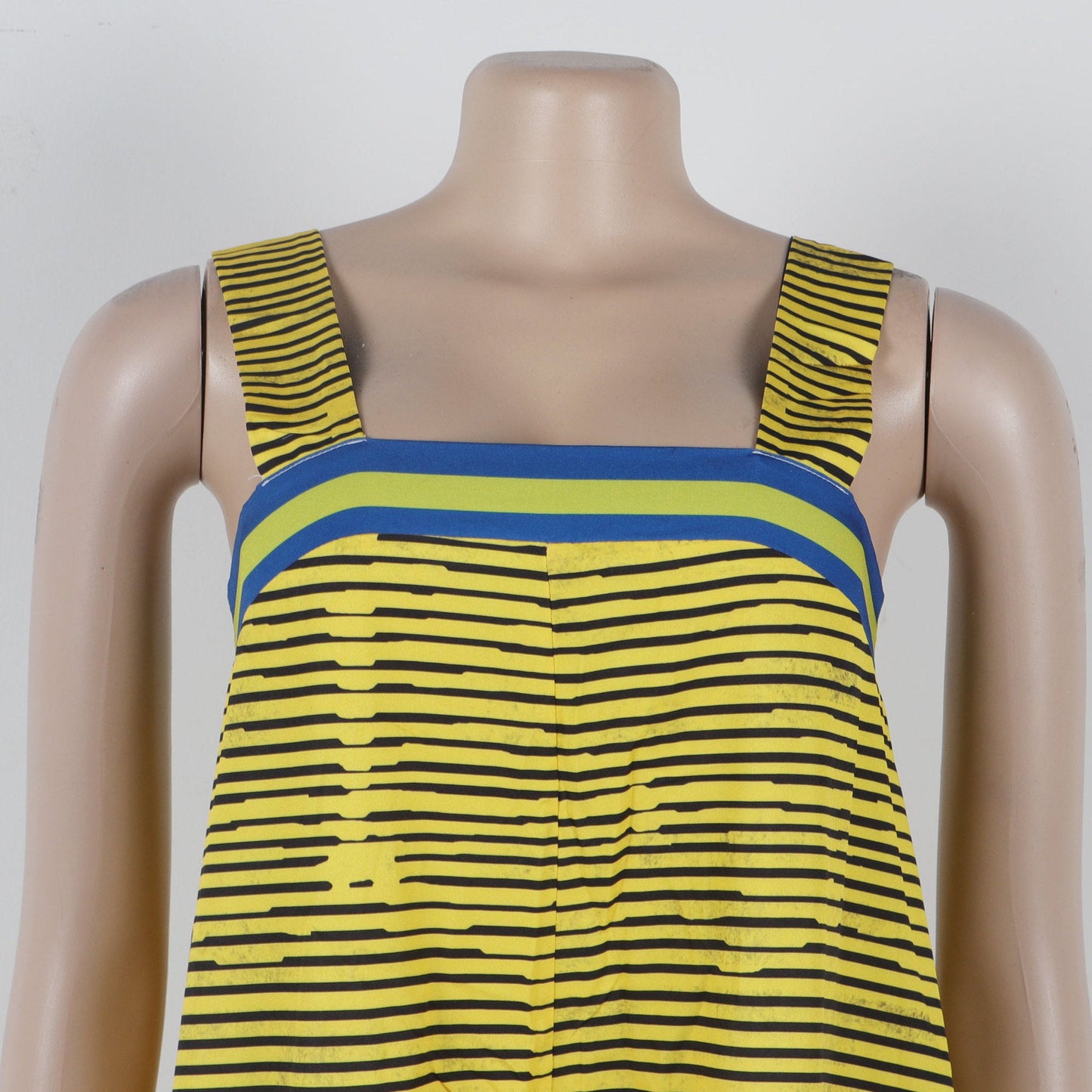 CM.YAYA Women’s Striped Wide Leg Sleeveless Jumpsuit featuring convenient pockets, showcasing practicality alongside elegance perfect for warm weather by Hot Trends Area.