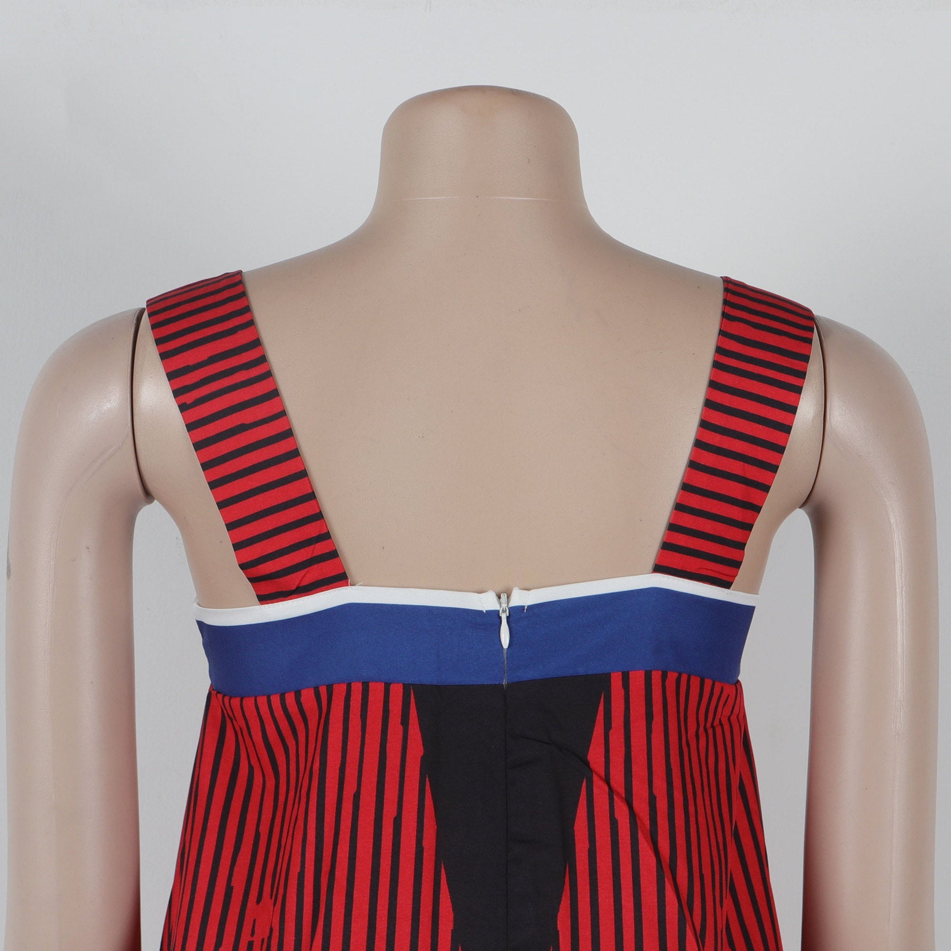 Model wearing CM.YAYA Women's Striped Wide Leg Sleeveless Jumpsuit, radiating elegance and comfort, designed for versatile summer occasions by Hot Trends Area.