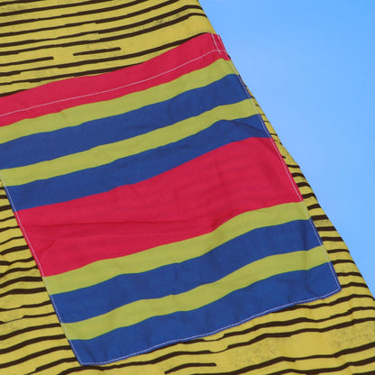 Elegant CM.YAYA Women's Jumpsuit in stylish striped pattern, artfully designed for comfort and sophistication, perfect for any warm weather event.