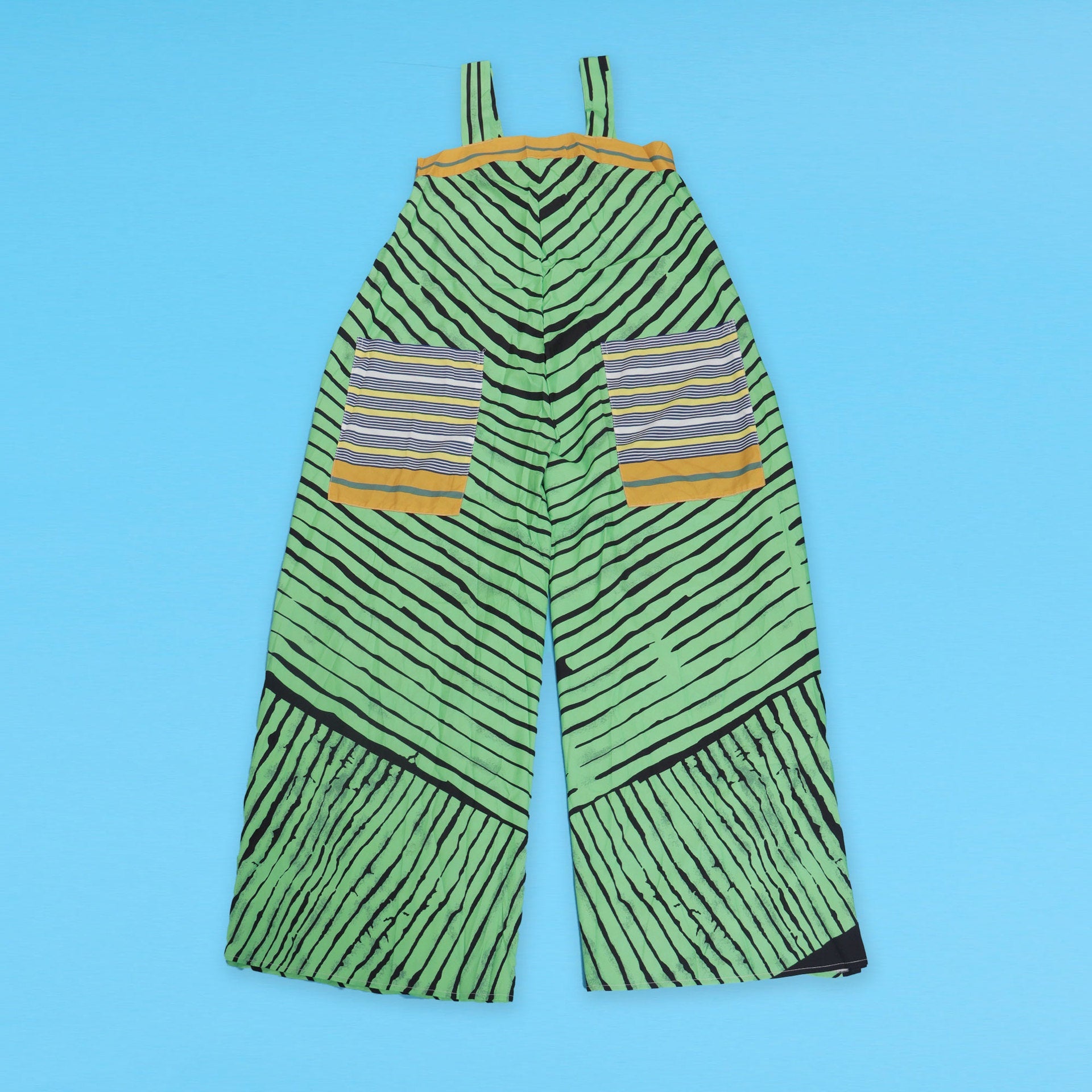 Full view of CM.YAYA Women's Striped Wide Leg Jumpsuit, a luxurious summer essential from Hot Trends Area, featuring flattering high waist and trendy loose fit.