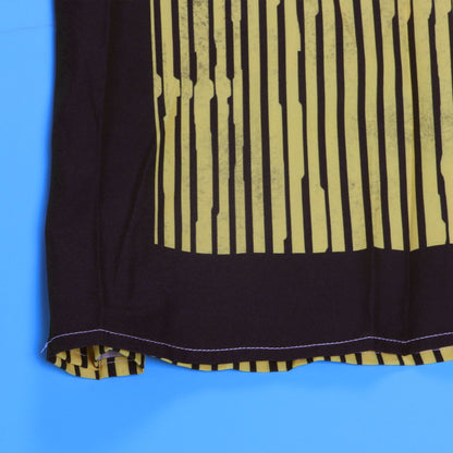 Elegant CM.YAYA Women’s Striped Wide Leg Sleeveless Jumpsuit with Pockets and High Waist, showcasing its sophisticated design and chic striped pattern in a luxurious summer setting.