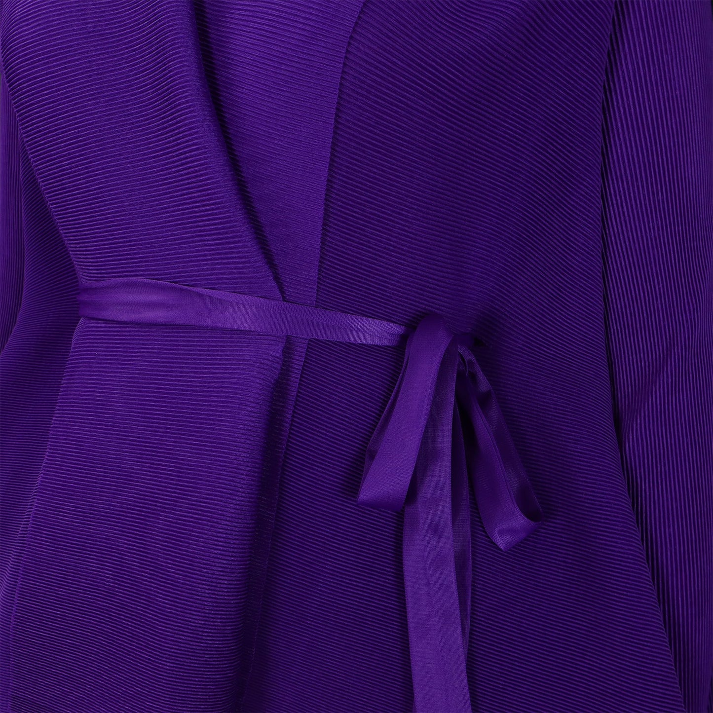 Chic pleated long skirt from CM.YAYA, showcasing a luxurious gradient pattern and a flattering fit for timeless style.