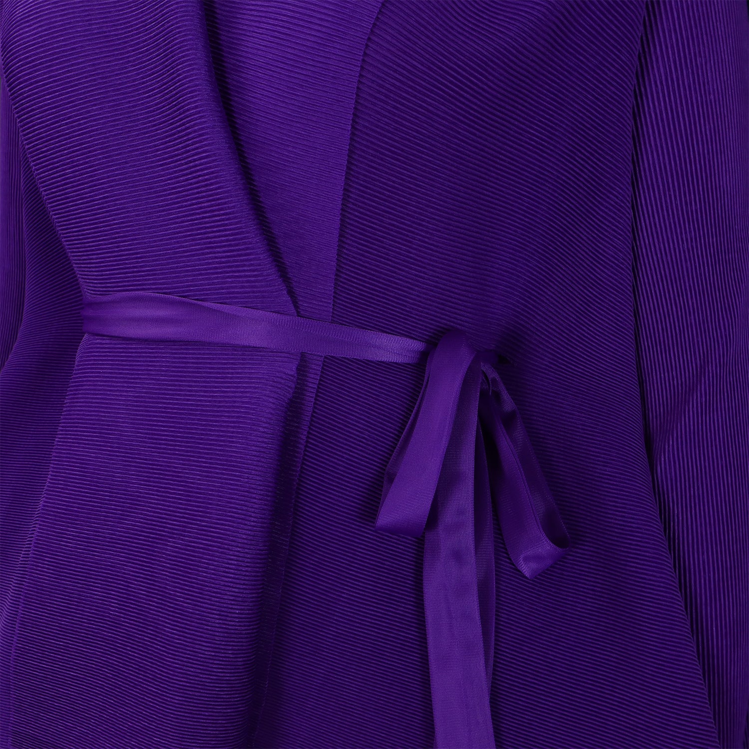 Chic pleated long skirt from CM.YAYA, showcasing a luxurious gradient pattern and a flattering fit for timeless style.