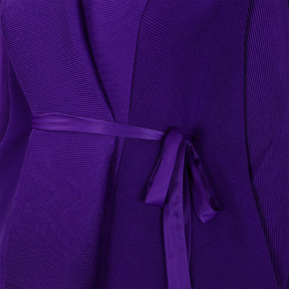 Chic pleated long skirt from CM.YAYA, showcasing a luxurious gradient pattern and a flattering fit for timeless style.