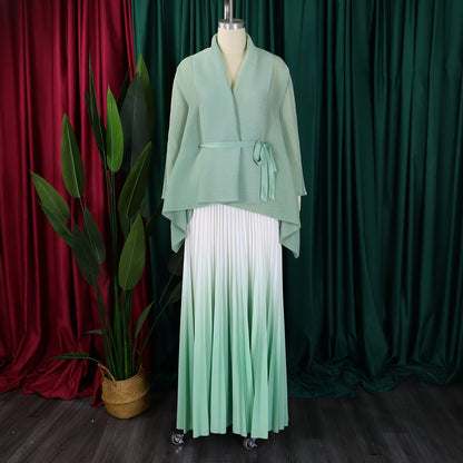 Stylish CM.YAYA full sleeve blouse with a chic belt, paired beautifully with a gradient pleated skirt, ideal for high street luxury.