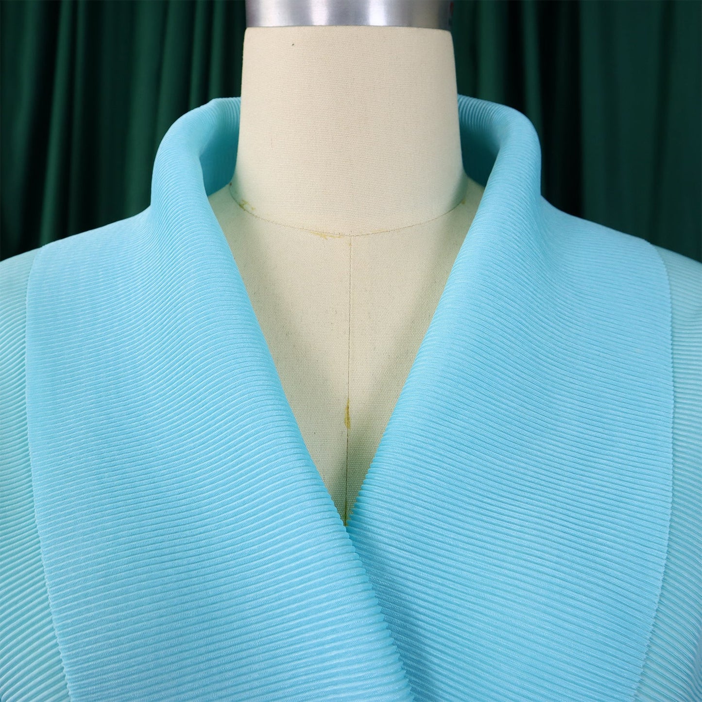 Chic and stylish CM.YAYA two-piece women's set, crafted for comfort and elegance, featuring a V-neck blouse and a floor-length skirt.