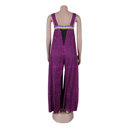 Stylish CM.YAYA women's striped jumpsuit, featuring wide legs and a sleeveless design, ideal for daytime or evening wear, available through Hot Trends Area.