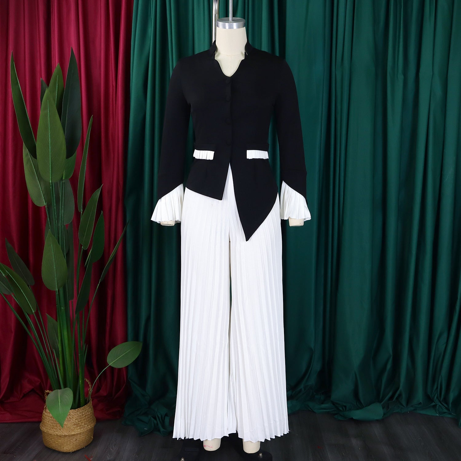 Close-up of the exquisite flare sleeve detail on the CM.YAYA women's blazer, reflecting luxury and modern office fashion.