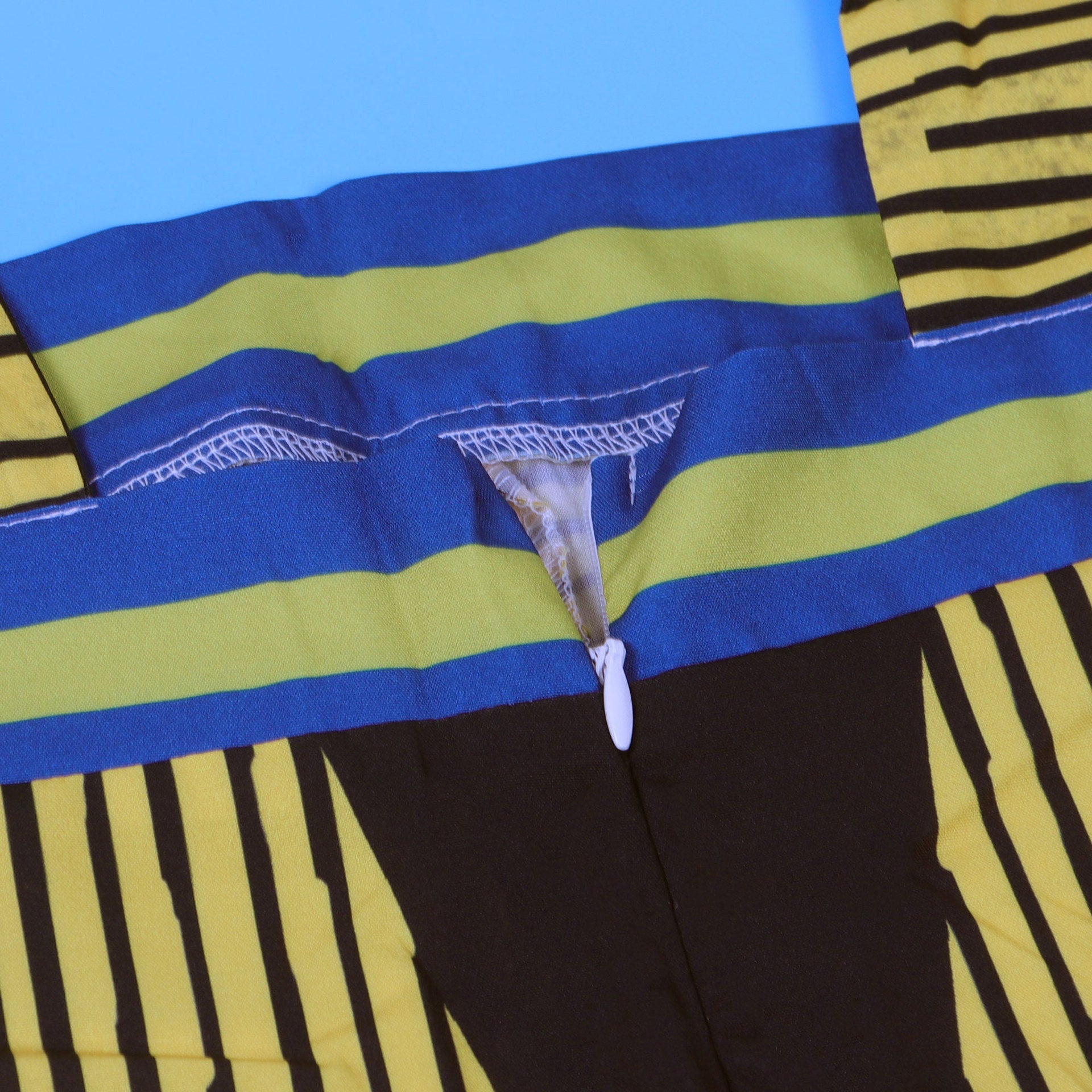 Versatile CM.YAYA Striped Sleeveless Jumpsuit elegantly styled for various occasions, epitomising summer fashion with its high waist and relaxed fit.