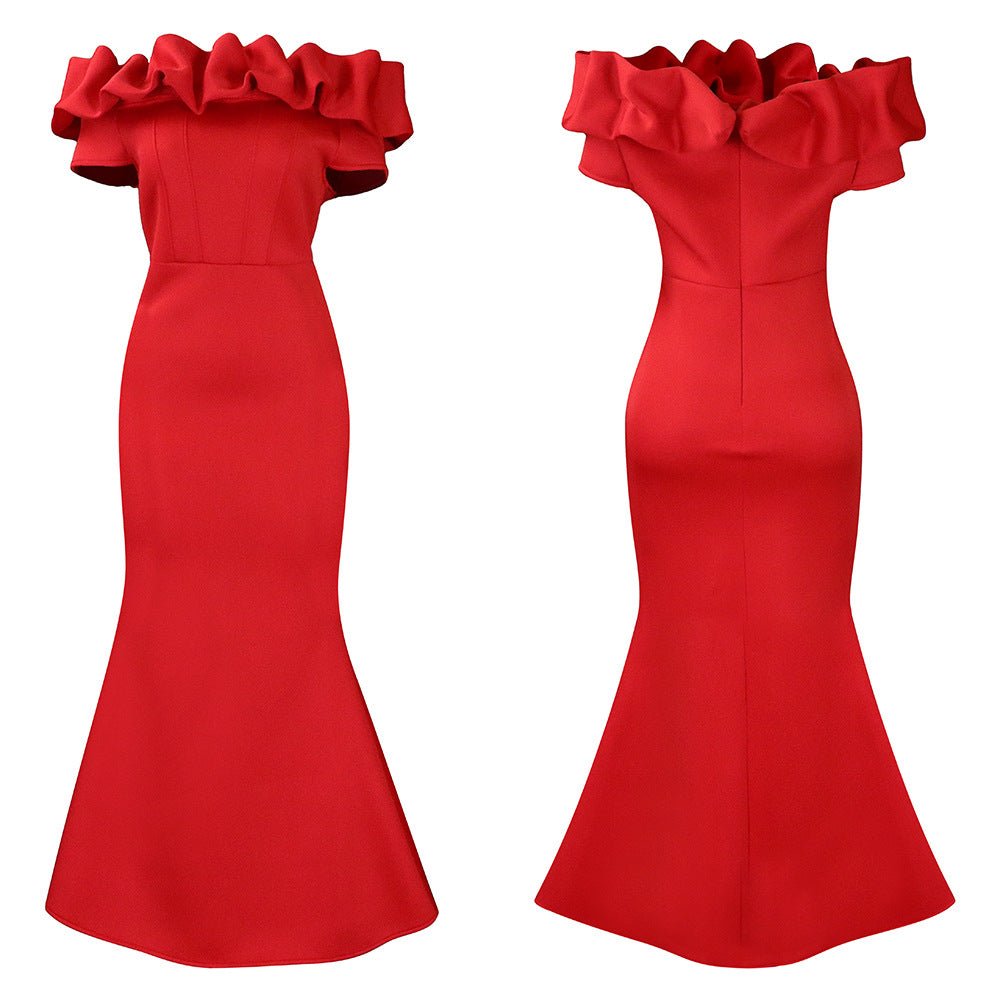 A stunning model wearing the floor-length off-shoulder mermaid gown, embodying grace and sophistication at a glamorous event.