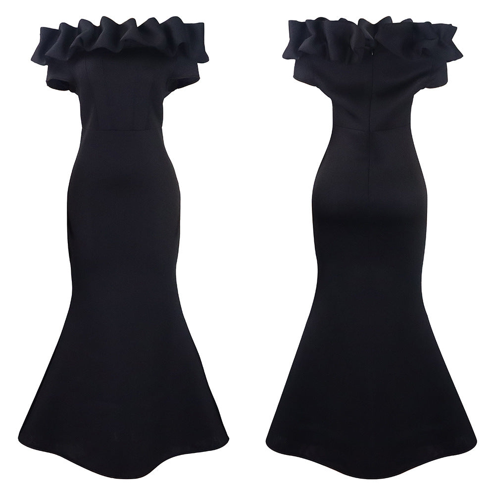 Detailed view of the exquisite off-shoulder neckline and fitted bodice of the elegant mermaid evening gown, perfect for upscale events.