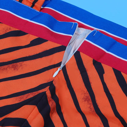 Elegantly styled CM.YAYA jumpsuit highlighting the flattering silhouette and high waist fit, designed for comfort and sophistication.