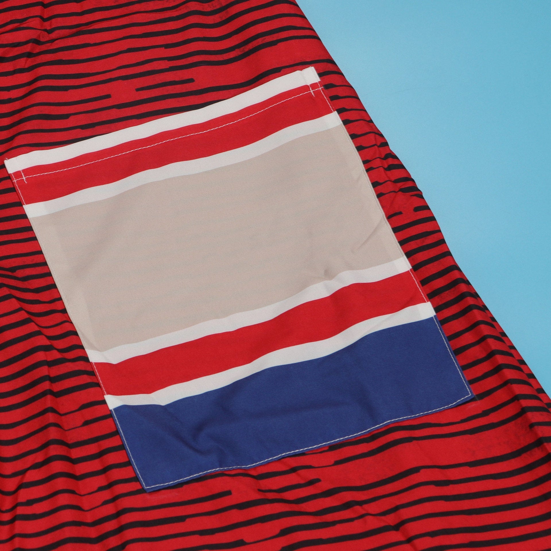 Back view of the CM.YAYA Women's Striped Jumper, highlighting the chic design and convenient pockets for a blend of fashion and functionality.