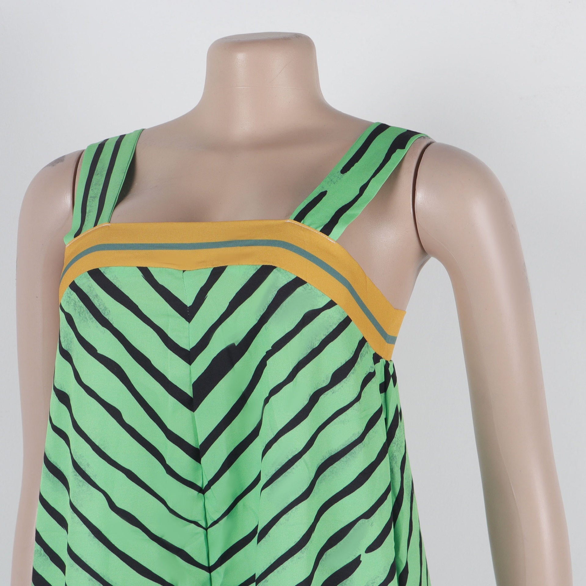 Close-up of the chic striped pattern on CM.YAYA Women's Wide Leg Jumpsuit from Hot Trends Area, highlighting premium quality polyester and stylish silhouette.