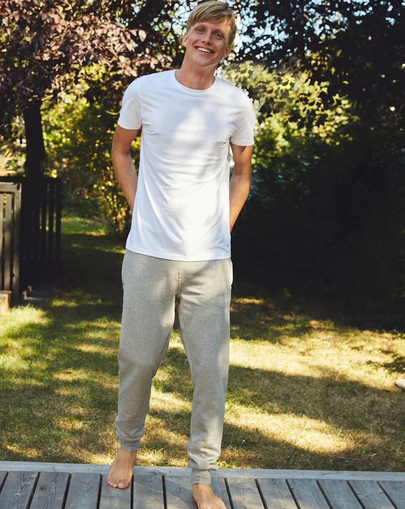 Luxurious Fairtrade Organic Unisex Sweatpants crafted from heavyweight fleece, featuring an adjustable fit, elegant design, and secure pockets, perfect for both men and women.