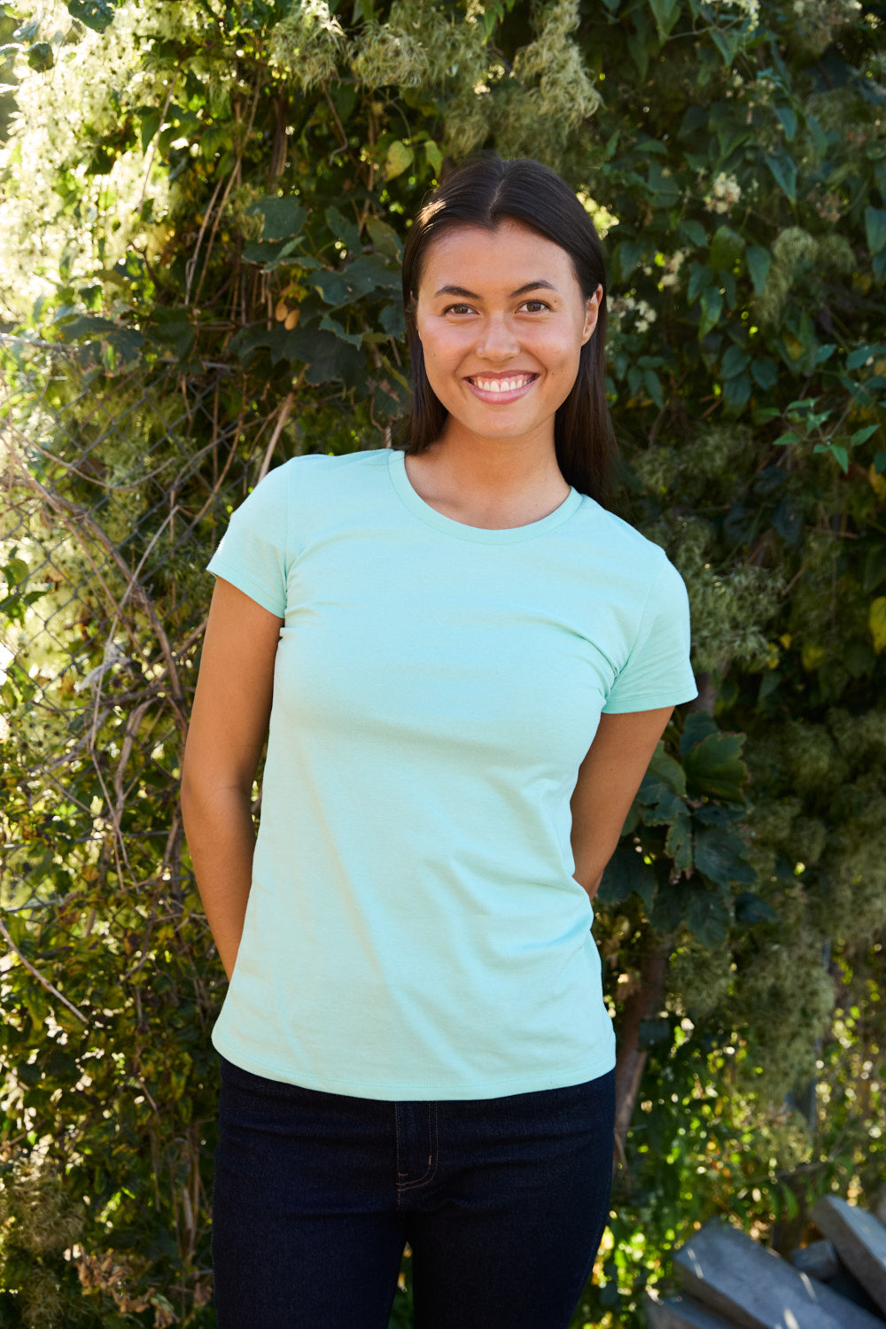 Sustainable Fairtrade cotton T-shirt exhibited in a minimalist style, highlighting its ethical production and versatility for layering or solo wear, ideal for conscious consumers.