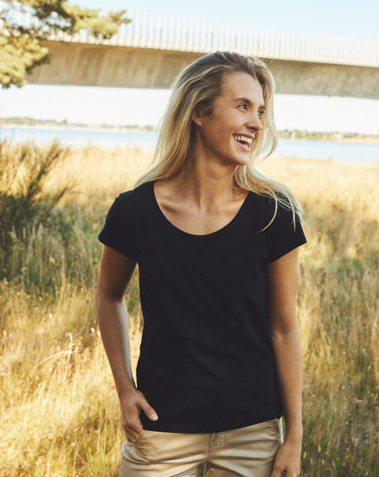 Luxurious image of an ethically made Fairtrade organic loose fit women's T-shirt in soft, breathable cotton, showcasing its relaxed silhouette.