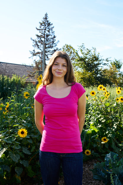 Detailed view of the roundneck and fitted cap sleeves of a luxury Fairtrade organic cotton T-shirt, highlighting superior craftsmanship and comfort.