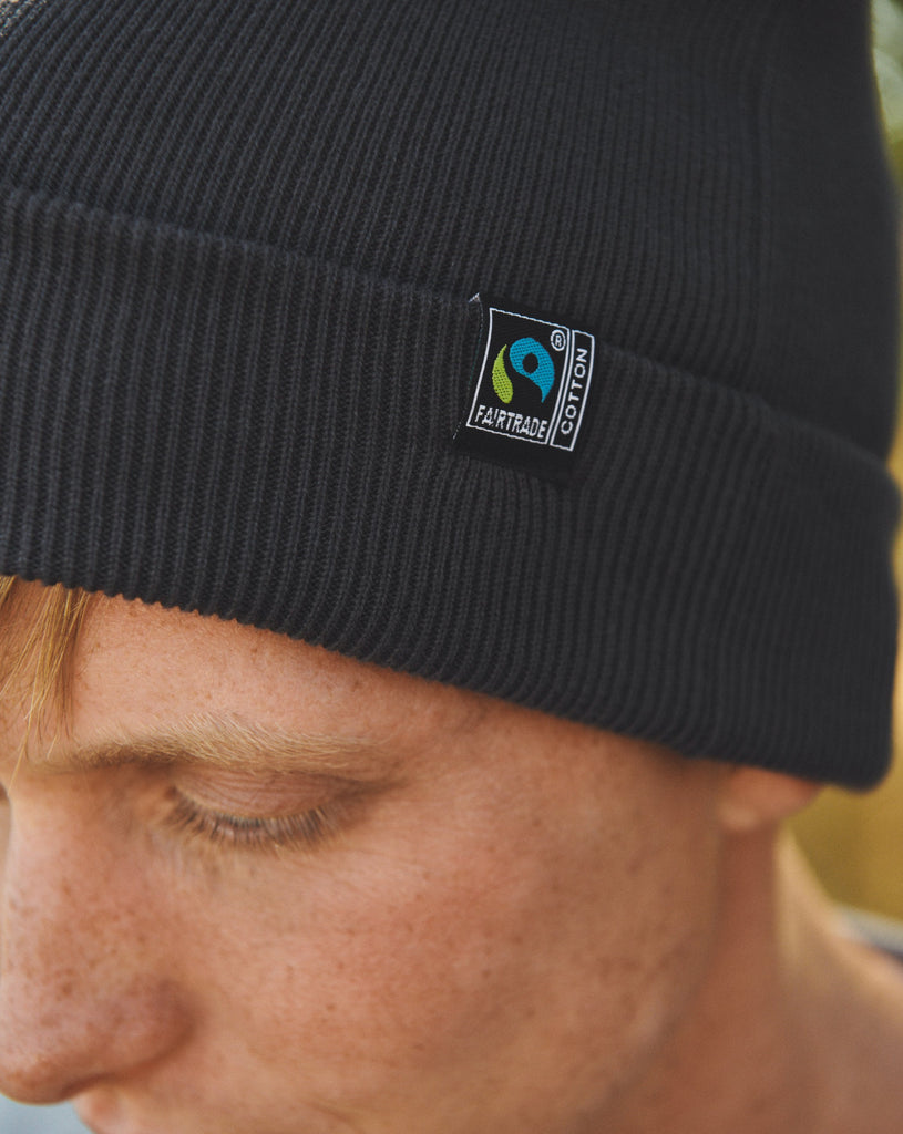 Luxurious Fairtrade Organic Cotton Beanie showcasing eco-friendly fashion, sustainable design, and ethical craftsmanship, perfect for stylish winter warmth.