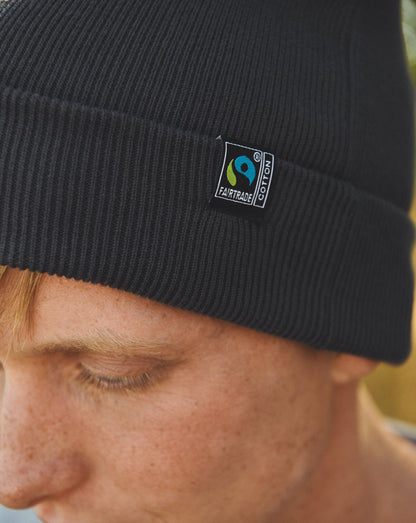 Luxurious Fairtrade Organic Cotton Beanie showcasing eco-friendly fashion, sustainable design, and ethical craftsmanship, perfect for stylish winter warmth.