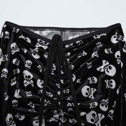 Punk Rave luxurious velvet flared trousers featuring intricate white skull print and an elegant waist tie, designed for gothic fashion lovers, showcasing a stylish blend of comfort and edgy aesthetics.