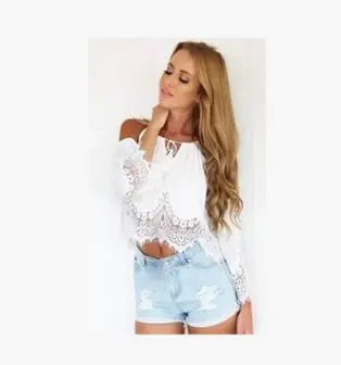 Stunning white lace chiffon blouse featuring intricate lace trim, elegantly paired with stylish denim shorts for a chic appearance.