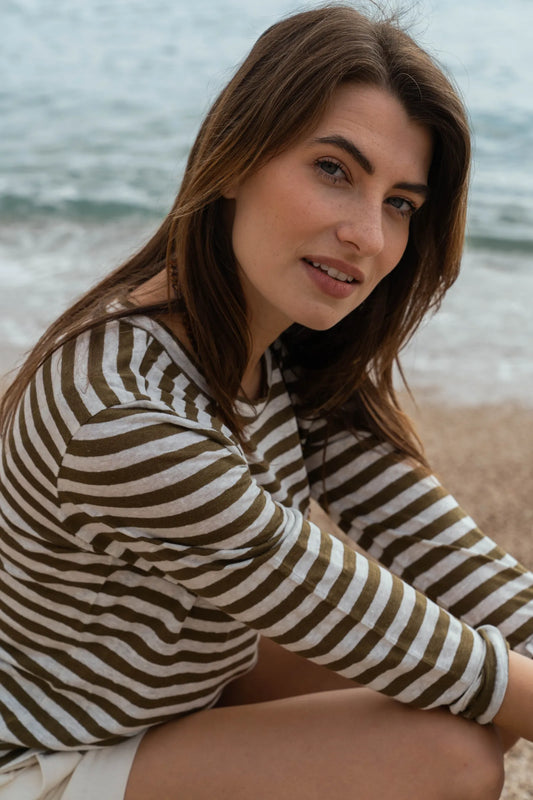 Elegant women's long sleeve striped linen t-shirt in classic Breton style, showcasing breathable and lightweight fabric.