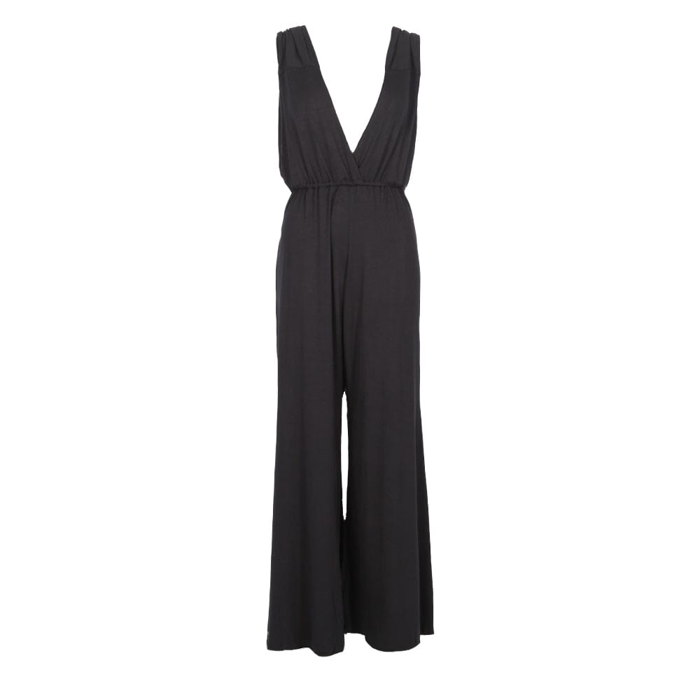 Fashionable backless wrap jumpsuit made from stretchy fabric, ideal for day-to-night wear, embodying a modern 'Greek goddess' look.