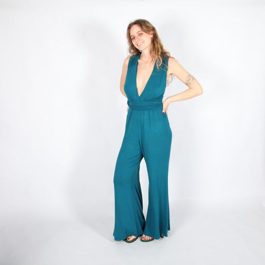 Stylish full length jumpsuit with flowing legs and deep V neck, epitomising sophistication and comfort, available in sizes S/M and L/XL.