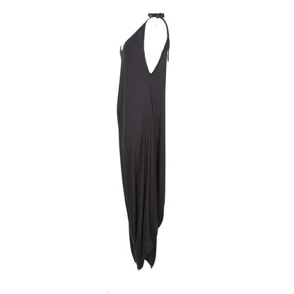 Elegant black harem jumpsuit featuring adjustable shoulder ties, perfect for sizes UK 8-16, styled for a luxurious look.