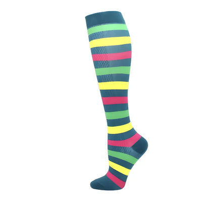 Stylish Women's Knee Length Compression Travel Socks with colourful green, yellow, and red stripes, designed for ultimate comfort, style, and circulation.
