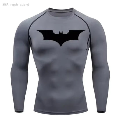 Chic grey men's compression shirt adorned with a bold black bat emblem, combining style and performance for discerning athletes.