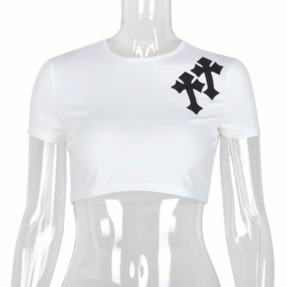 Elegant women's Bless Up Embroidered Crop Tee by Dazzling Dreams Studio in a chic slim fit design, showcasing its vibrant embroidered pattern and lightweight feel.