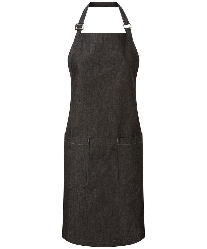 Elegant organic cotton denim apron highlighting two spacious mitred pockets and eco-friendly properties, perfect for gourmet cooking and sustainable fashion.