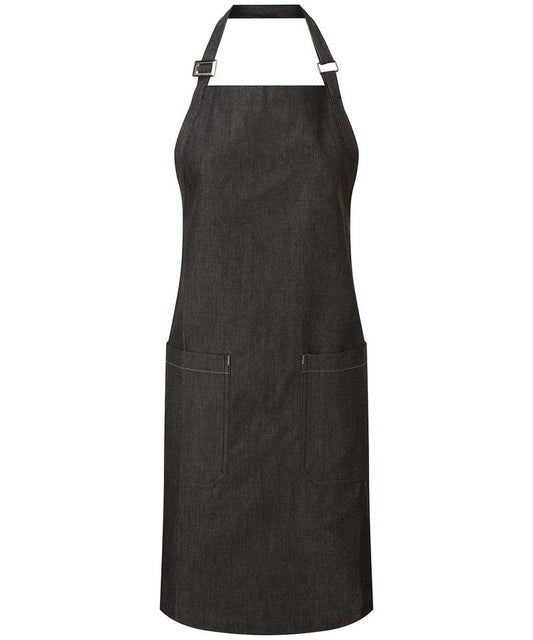 Elegant organic cotton denim apron highlighting two spacious mitred pockets and eco-friendly properties, perfect for gourmet cooking and sustainable fashion.
