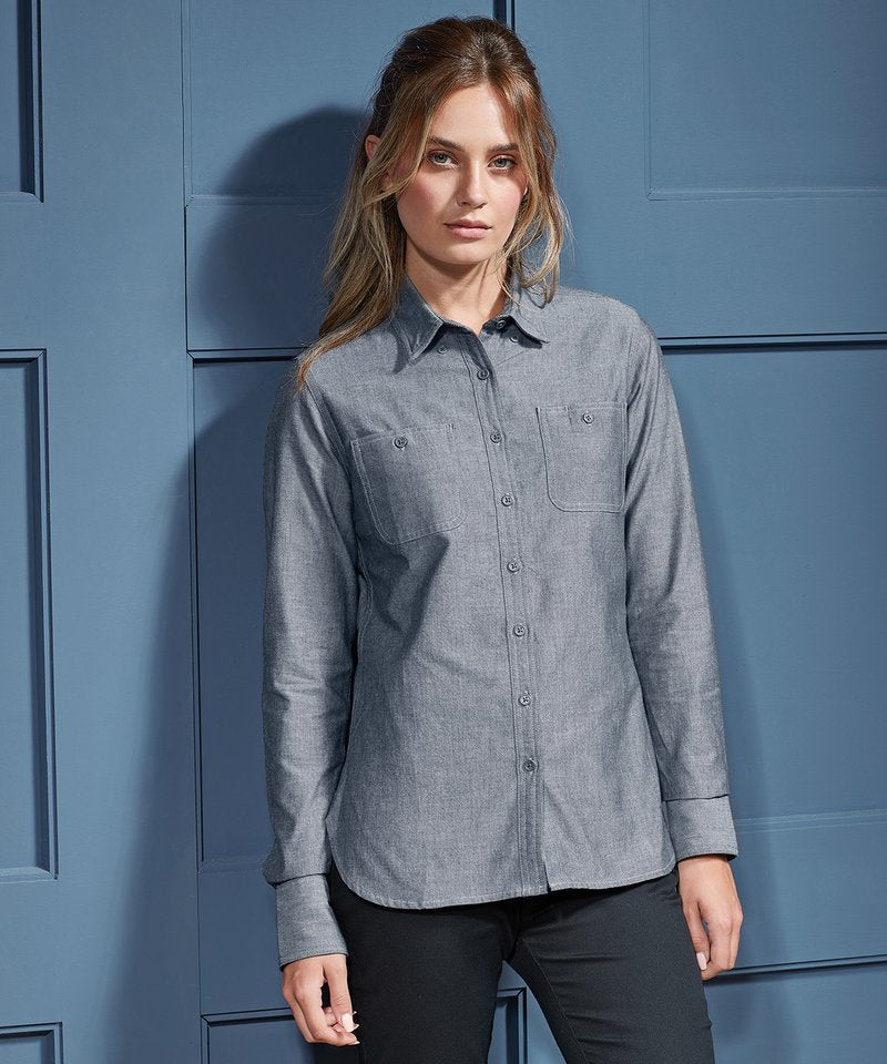 Elegant Eco-Friendly Organic Chambray Shirt for Women featuring Adjustable Cuffs, Deep Curved Hem, and Stylish Chest Pockets by Earth Wardrobe.