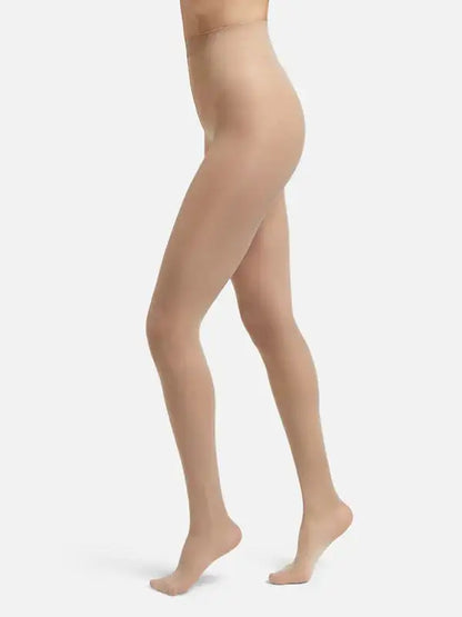 Women's Secret Sheer Plush Lined Tights in beige, elegantly showcasing a sleek silhouette for stylish warmth on chilly days.