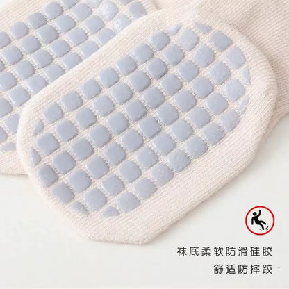 Elegant Women's Girls Non-Slip Safety Winter Warmer Grippy Socks, demonstrating their non-slip soles for enhanced safety.