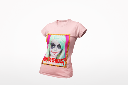 Stylish pink women's graphic tee with a unique artwork displaying a Joker-inspired character, beautifully framed in gold, perfect for a fashionable statement.