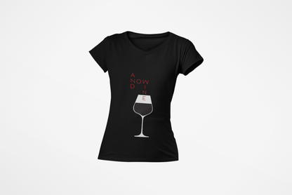 Black women's t-shirt featuring the humorous graphic 'And Now Wine', designed for wine lovers, with a stylish illustration of a wine glass.