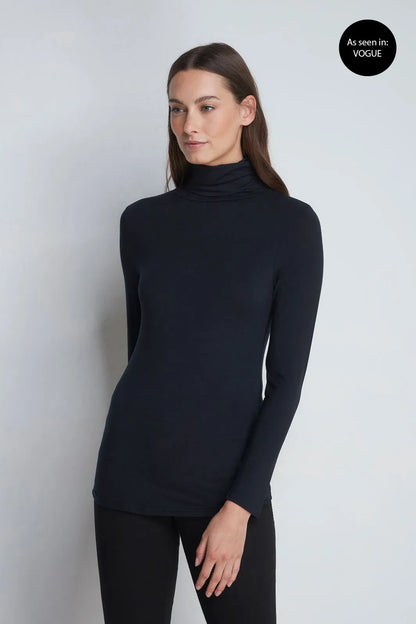 Timeless Women's Roll Neck TENCEL™ Micro Modal Top in rich colour, perfect for cooler weather layering, showcasing tailored fit and sophistication.