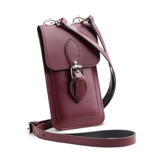 Elegant luxury handmade marsala red leather mobile phone pouch by Zatchels, showcasing its exquisite craftsmanship and premium texture.